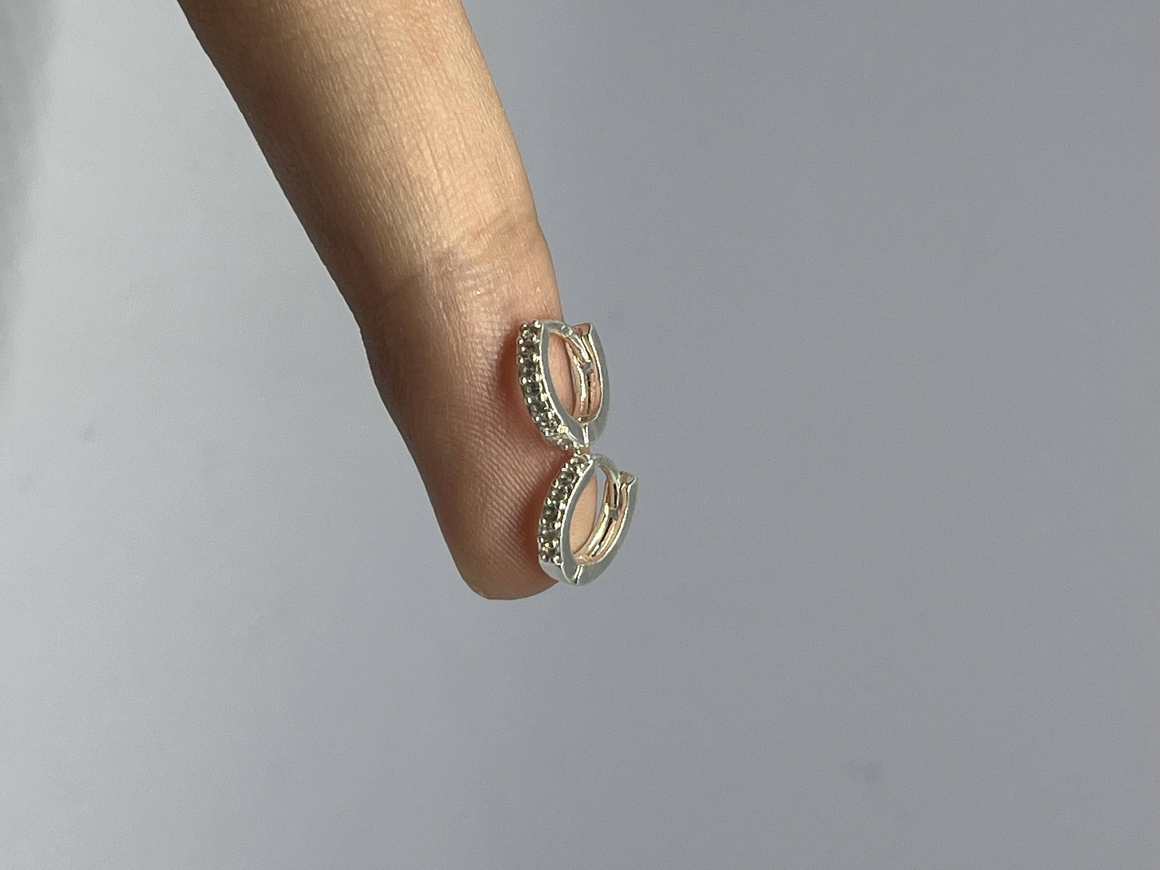 Argola cravejada Origem